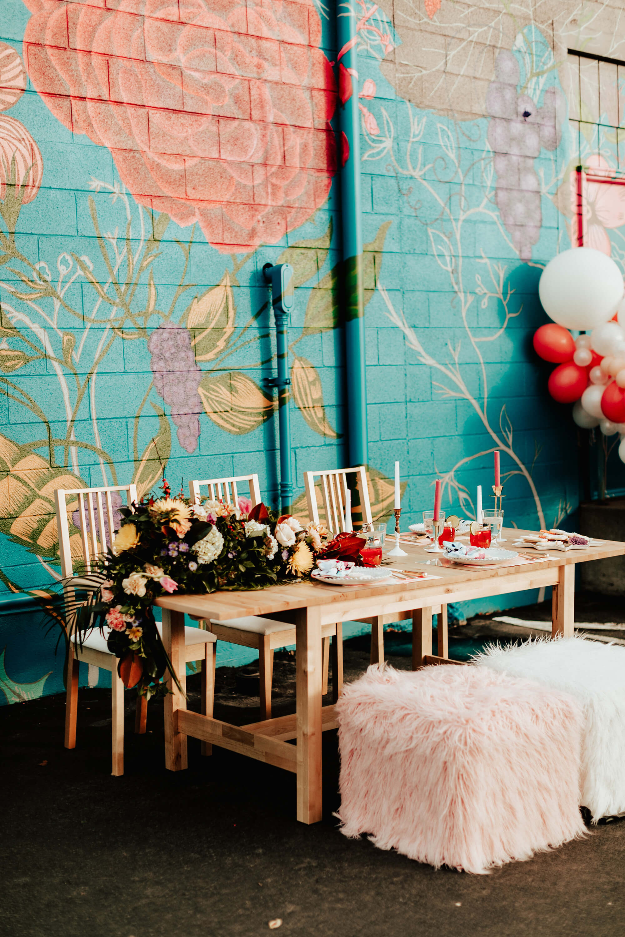 colorful mural wedding florals with balloons