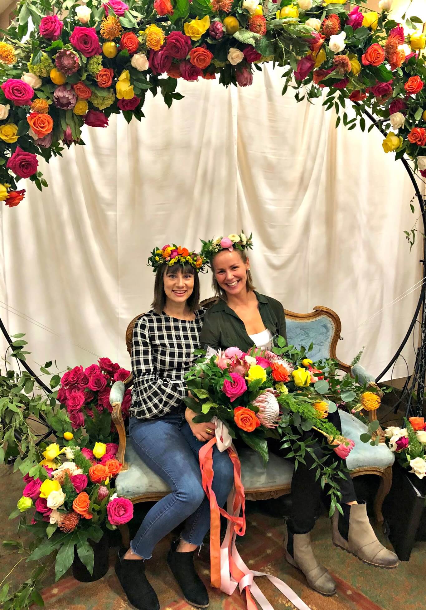 large circle floral arch photo booth backdrop
