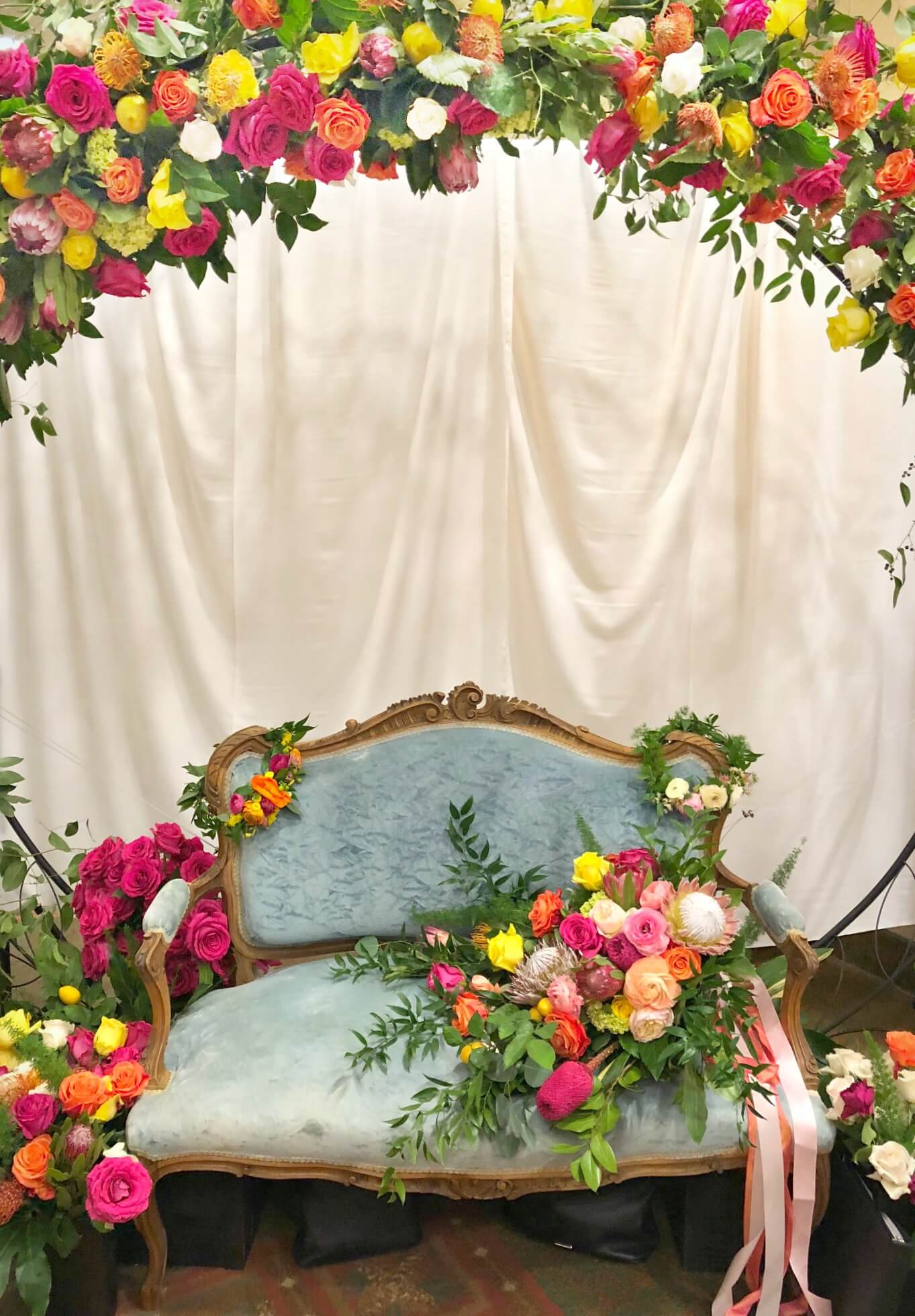 circle floral arch photo booth backdrop