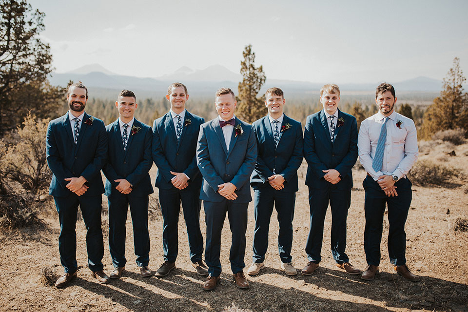 groom and groomsmen in blue suits