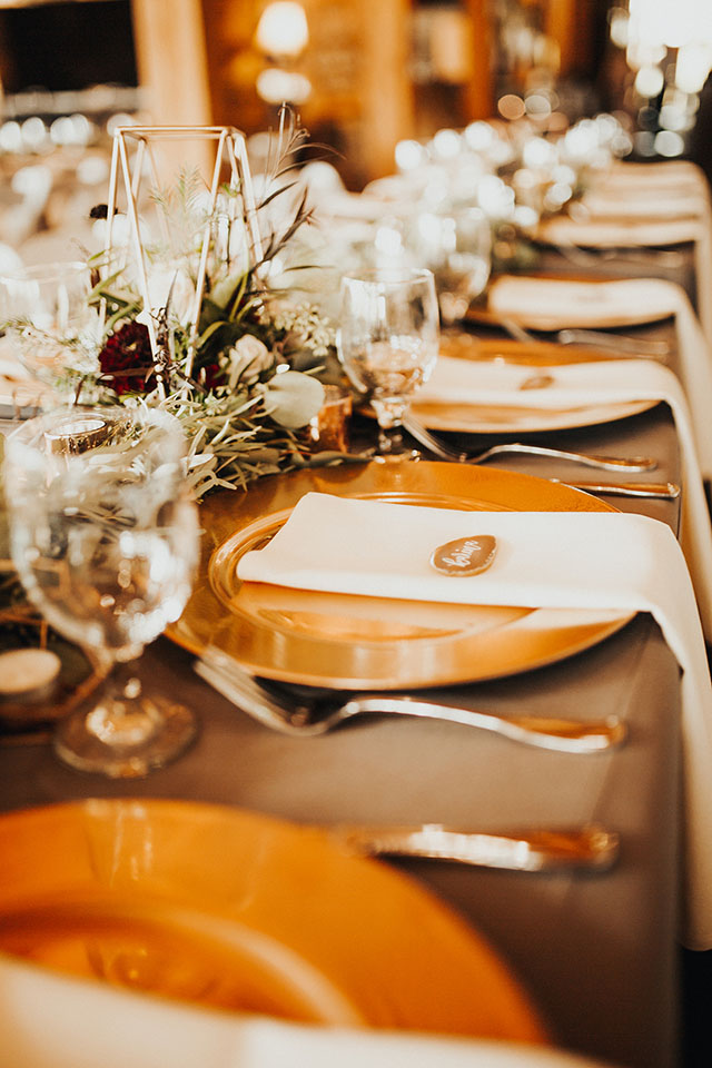 copper chargers grey linens greenery garland