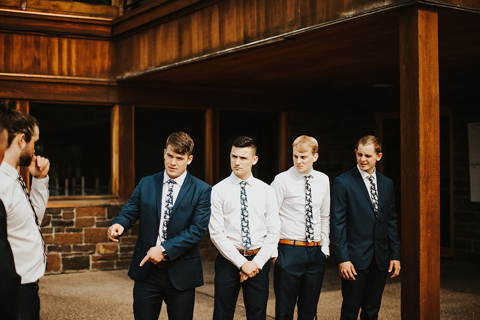 groomsmen blue suits broken top club wedding