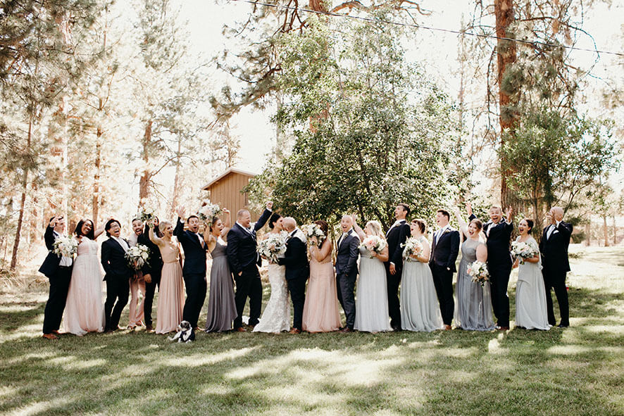 bridal party photo lodge forest wedding