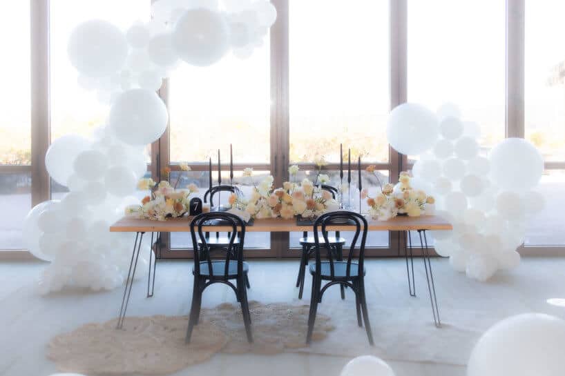 dining table and white balloons